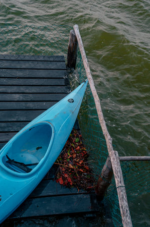 A closeup of a blue kayak on the boardwalk in Cancun, Mexico