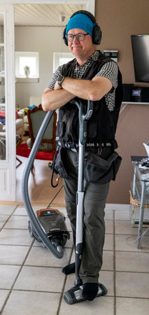 A Caucasian Detectorist with a vacuum cleaner in Denmark