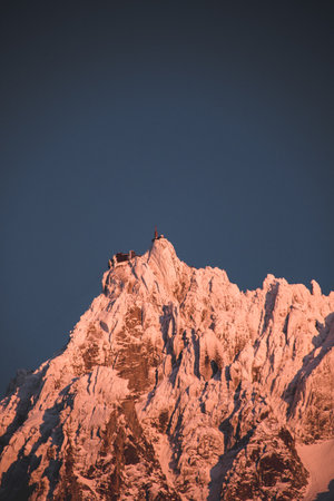 A vertical shot of the beautiful mountains on a cold winter dayの写真素材