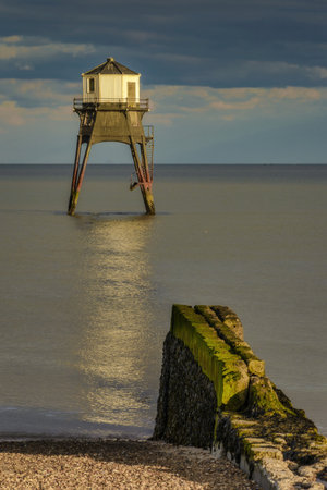 A beautiful view of a Lighthouse at the Dovercourt near the coast in UKの写真素材