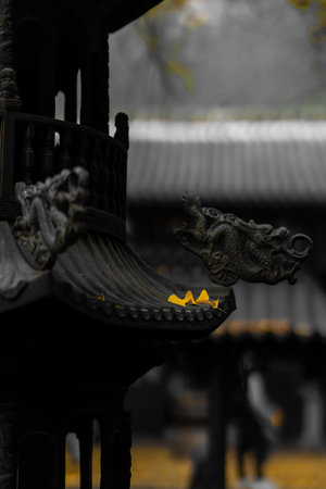 A vertical shot of the architectural details of an old templeの写真素材