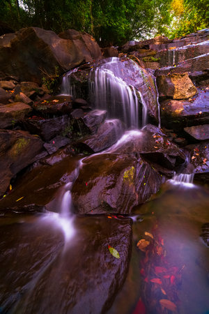 Beautiful natural waterfall inside the jungle at Mambo