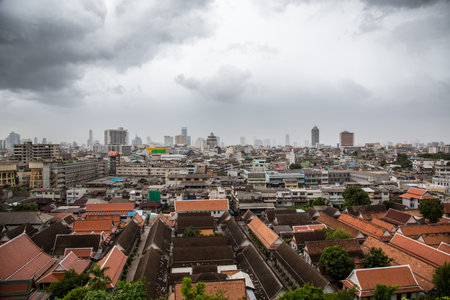 An aerial view of a city under the cloudy skyの写真素材