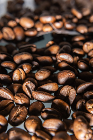 A closeup shot of scattered coffee beansの写真素材