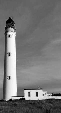 A scenic view of the lighthouse outside Dunbar, Scotland
in grayscaleの写真素材