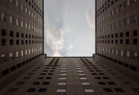 A beautiful view of an apartment with small windows in a city