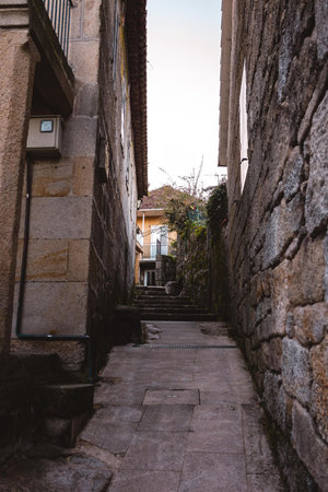 A vertical shot of an old town with historic buildings in Galicia, Spain