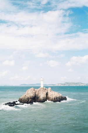 A vertical shot of a lighthouse
