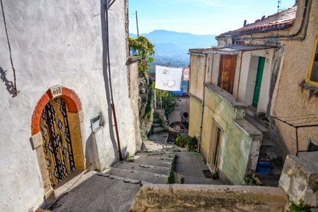 A narrow street among the old houses of a medieval town in the province of Salerno, in the Campania region.の写真素材