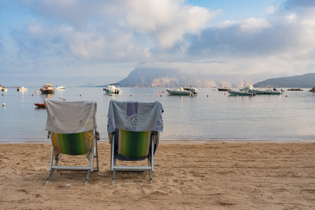 A beautiful view of the Tavolara island from the beach of Cala Suaraccia in Sardinia, Italyの写真素材