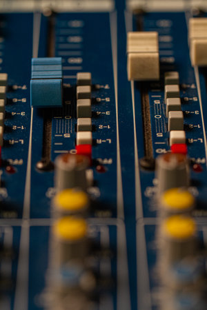 A picture of buttons of an analog sound console