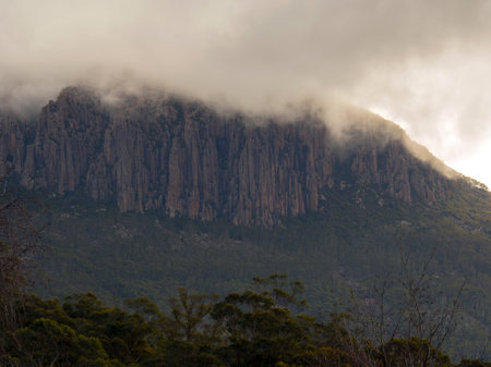 A view of a mountain peak in the fog.の写真素材