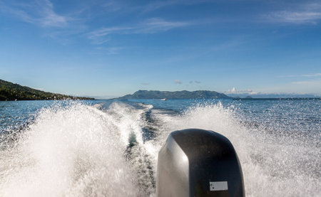 Water taxi crossing the Indian Ocean at high speed near the isle of Nosy Be, Madagascar