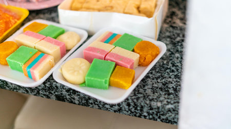 A closeup shot of the delicious Indian sweets on the tableの写真素材
