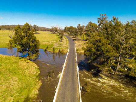 A traffic road over the Seven river with nearby dense vegetation in Australiaの写真素材