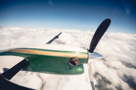 An aerial view of an airplane wingの写真素材