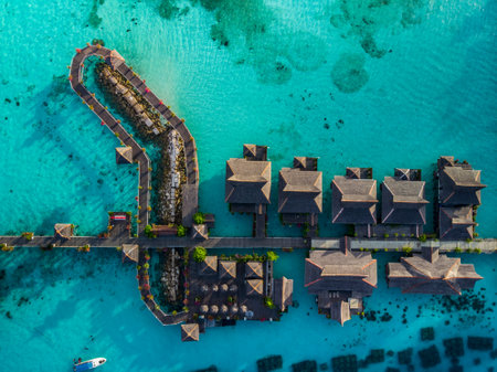 A top view of bungalows on the beautiful Mabul Island in Malaysia