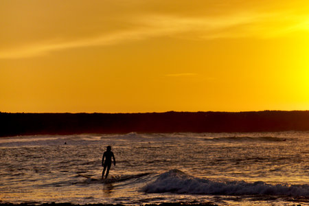 A mesmerizing view of the golden sunset over the sea