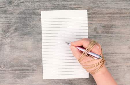 Cancel culture, chained hand with a pen, free press,freedom of speech, discrimination and...