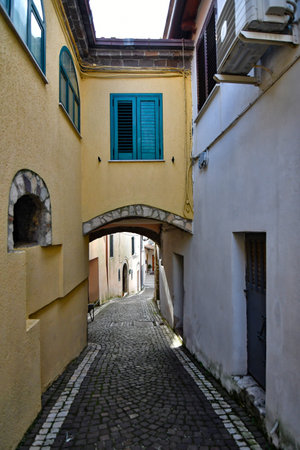 A narrow street in Castel di Sasso, a small village in the mountains of the province of Caserta.の写真素材
