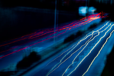 The blurred lights of the cars in motion