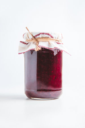 A closeup of jars of artisana jam