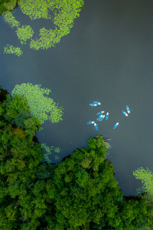 An aerial view of a lake with boatsの写真素材