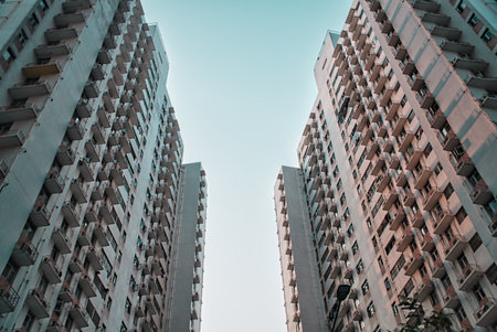 A low angle shot of skyscrapers on a blue sky background in Macau, China