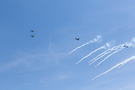 A beautiful view of Military aircraft in a blue skyの写真素材