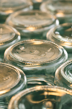 A closeup shot of upside down clear glass jarsの写真素材