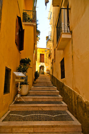 A narrow street in Diamante, a village in Calabria, Italy.の写真素材