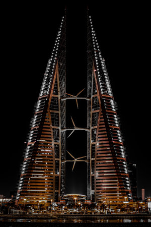 A vertical shot of a modern building with a cloudless sky in the backgroundの写真素材