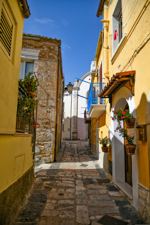 A vertical shot of a narrow street in Ascoli Satriano, an old town in the province of Foggia, Italy.の写真素材