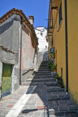 A small street between the old houses of Castelluccio Superiore, Italy.の写真素材