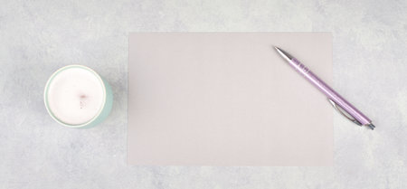 Empty paper with a pen and a cup of coffee, textured background, brainstorming for new ideas,...