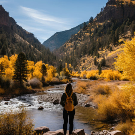 An AI-generated illustration of a woman standing in a shallow creek surrounded by tall hillsの素材
