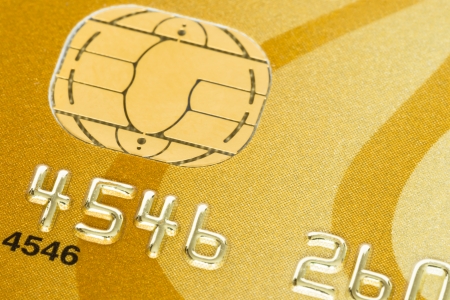 Gold credit card with micro chip selective focusの写真素材