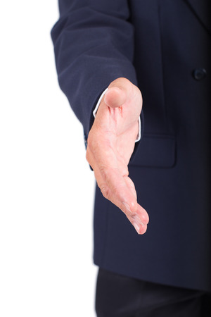 Businessman giving hand for handshakeの写真素材