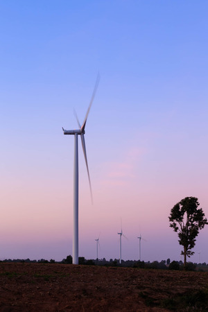 Wind turbine power generator at twilightの写真素材