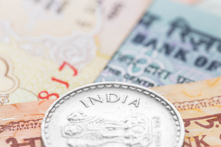 Indian money banknote focus on coin indiaの写真素材