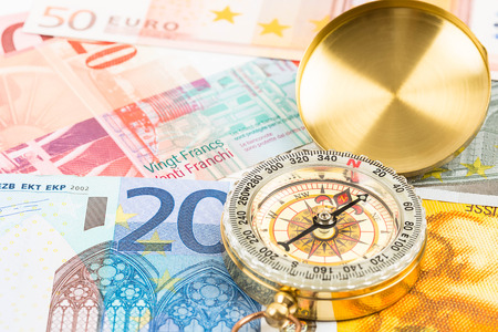Compass on european banknote concept financial directionの写真素材