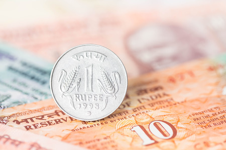 India money banknote focus on coin rupeeの写真素材
