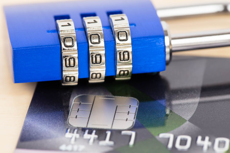 Combination padlock on credit cardの写真素材