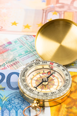 Compass on european banknote concept financial directionの写真素材