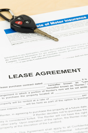 Lease agreement with car key; document is mock-upの写真素材