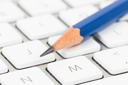 Pencil on keyboard concept blog writerの写真素材