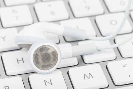 Earphone on computer keyboard