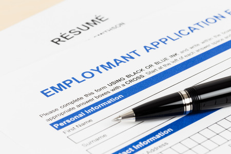 Employment application form with pen document is mockupの写真素材