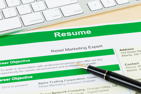 Resume with keyboard and pen; resume and information are mock-upの写真素材