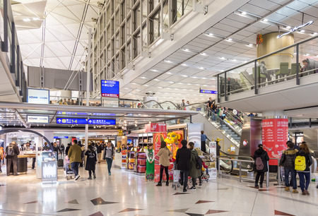 Hong Kong, China - January 24, 2016: Duty free shops in departure hall at Chek Lap Kok International Airport.のeditorial素材